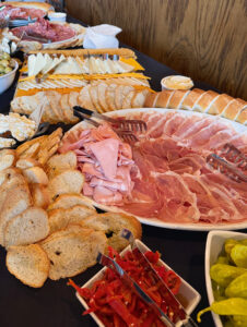 spread of meats, cheeses, and more
